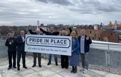 image shows members of Blyth's Pride in Place Board welcoming the announcement