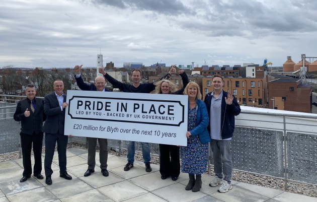image shows members of Blyth's Pride in Place Board welcoming the announcement