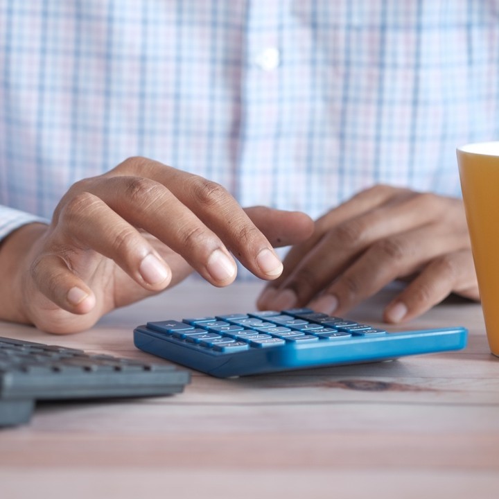 Person using calculator